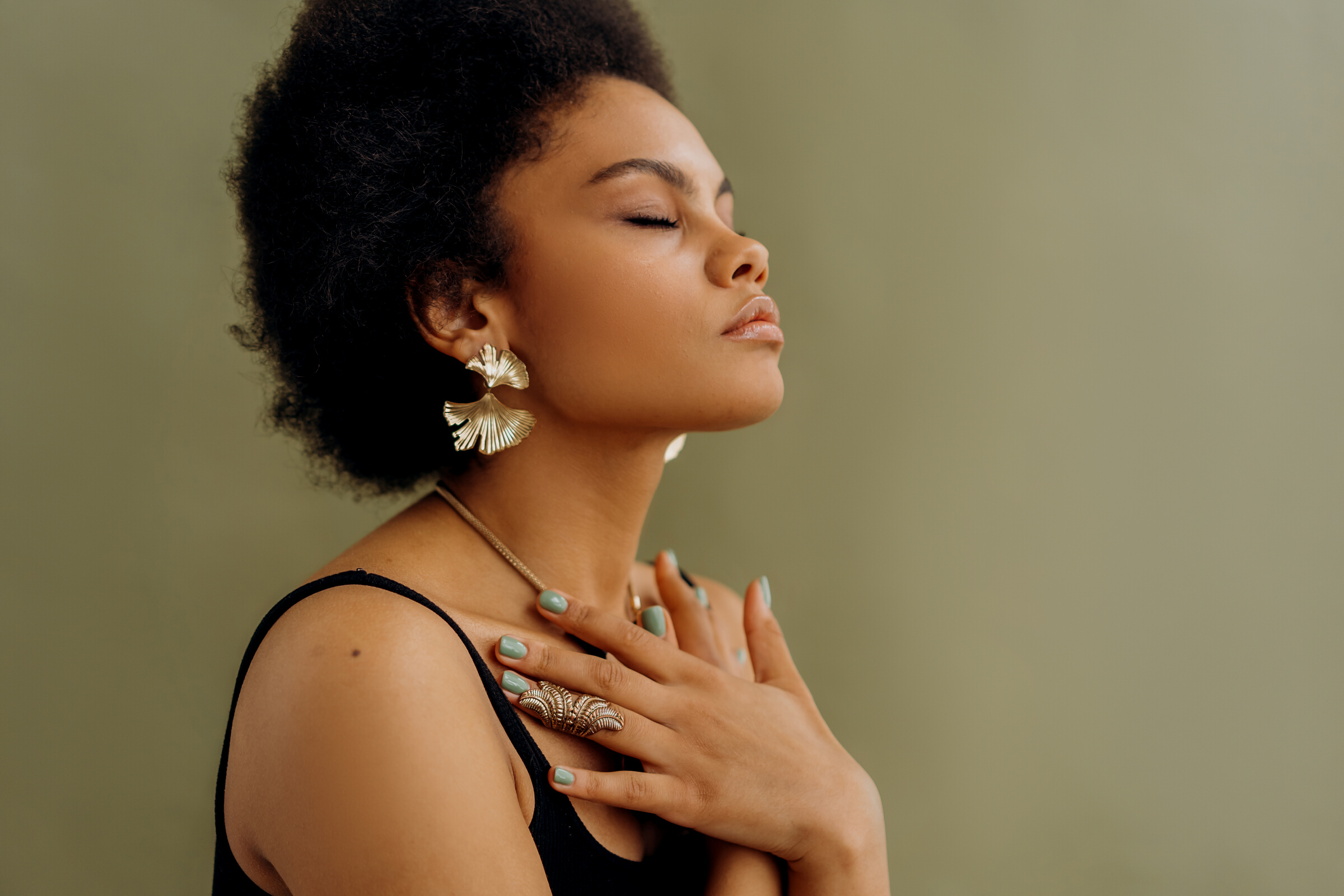 Woman in Black Spaghetti Strap Top Meditating